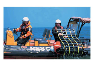 Two rescuers on a boat using Jason's Cradle man-overboard recovery system for safe victim recovery at sea.